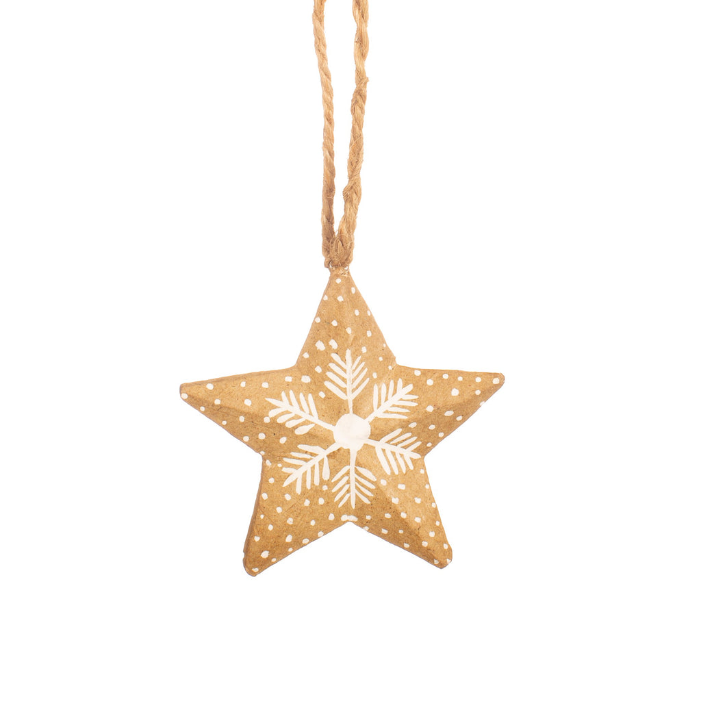 Made using papier mache this star shaped decoration features a drawn snowflake design and hangs from jute string. 