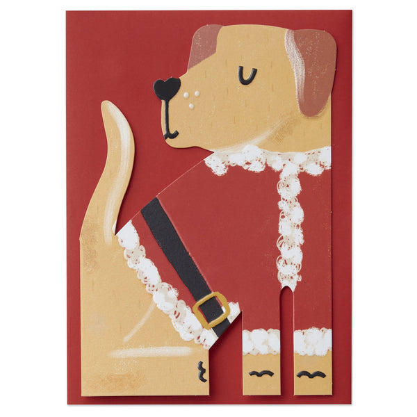 The card is die cut and embossed. It is an illustration of a golden labrador dog dressed in a red and white santa coat with a black belt with golden buckle.  