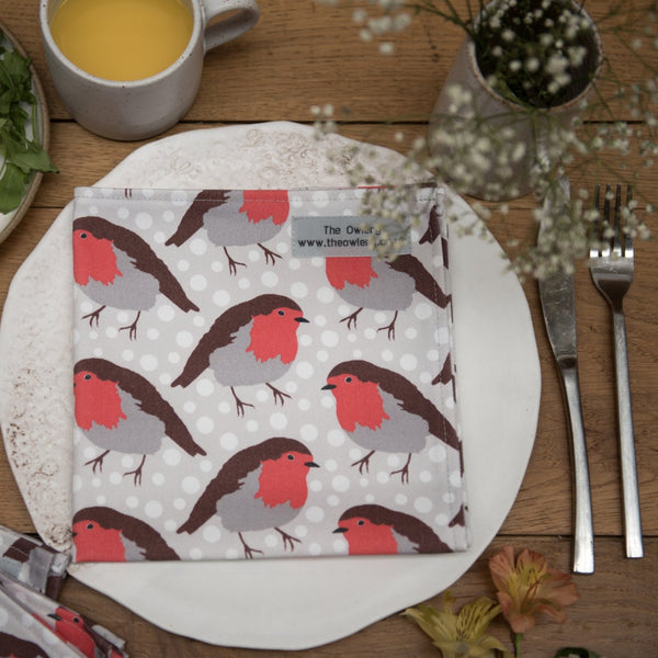 2 x snow graphic printed fabric napkins with robin motif.