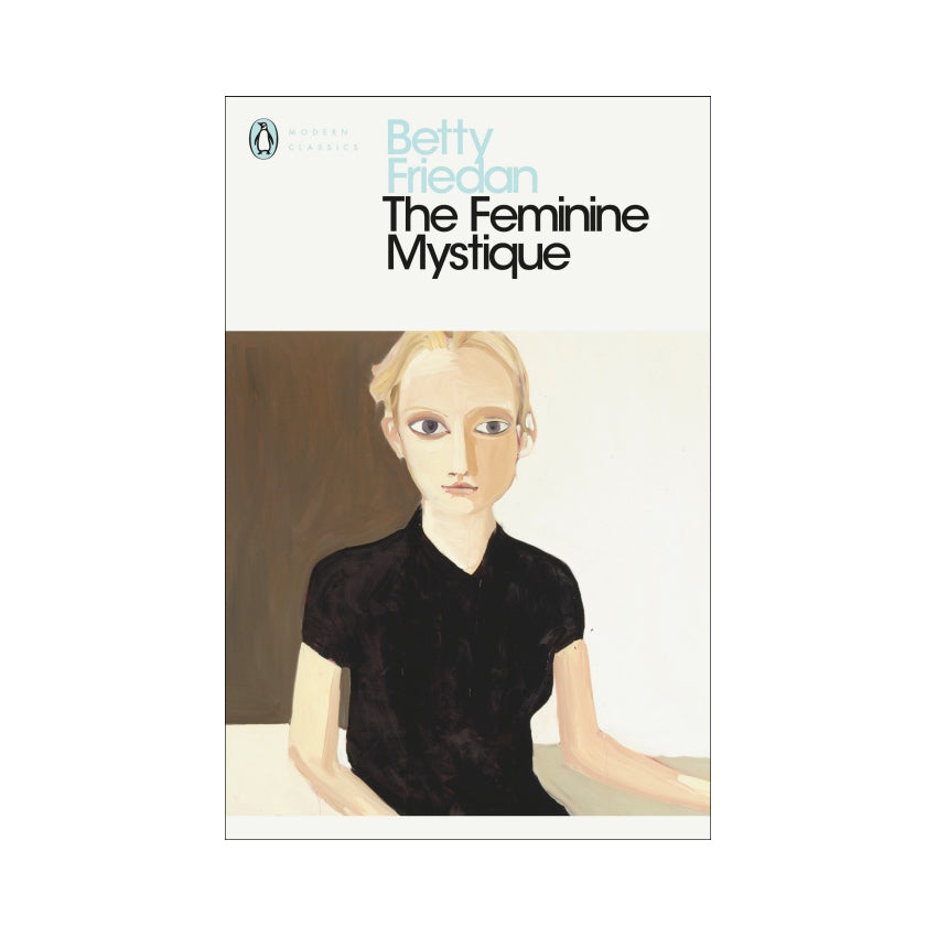 Cover of 'The Feminie Mystique' by Betty Friedan. White background with pale blue and black text, small penguin logo. Painting of a young women sat down wearing a black top. 