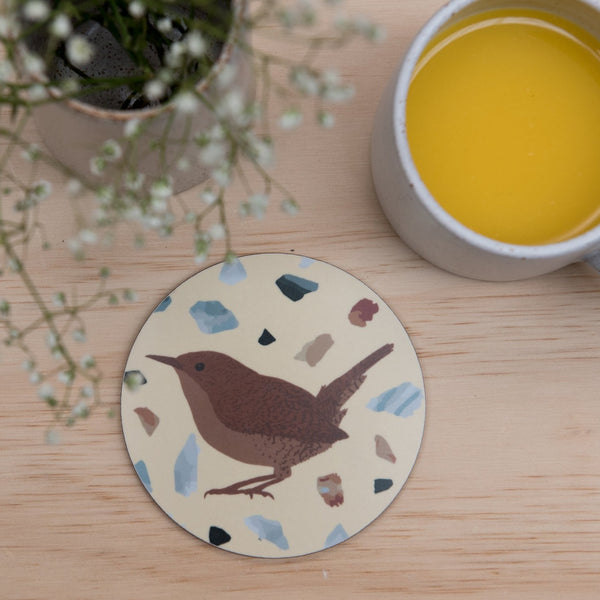 Graphic printed coaster with wren motif