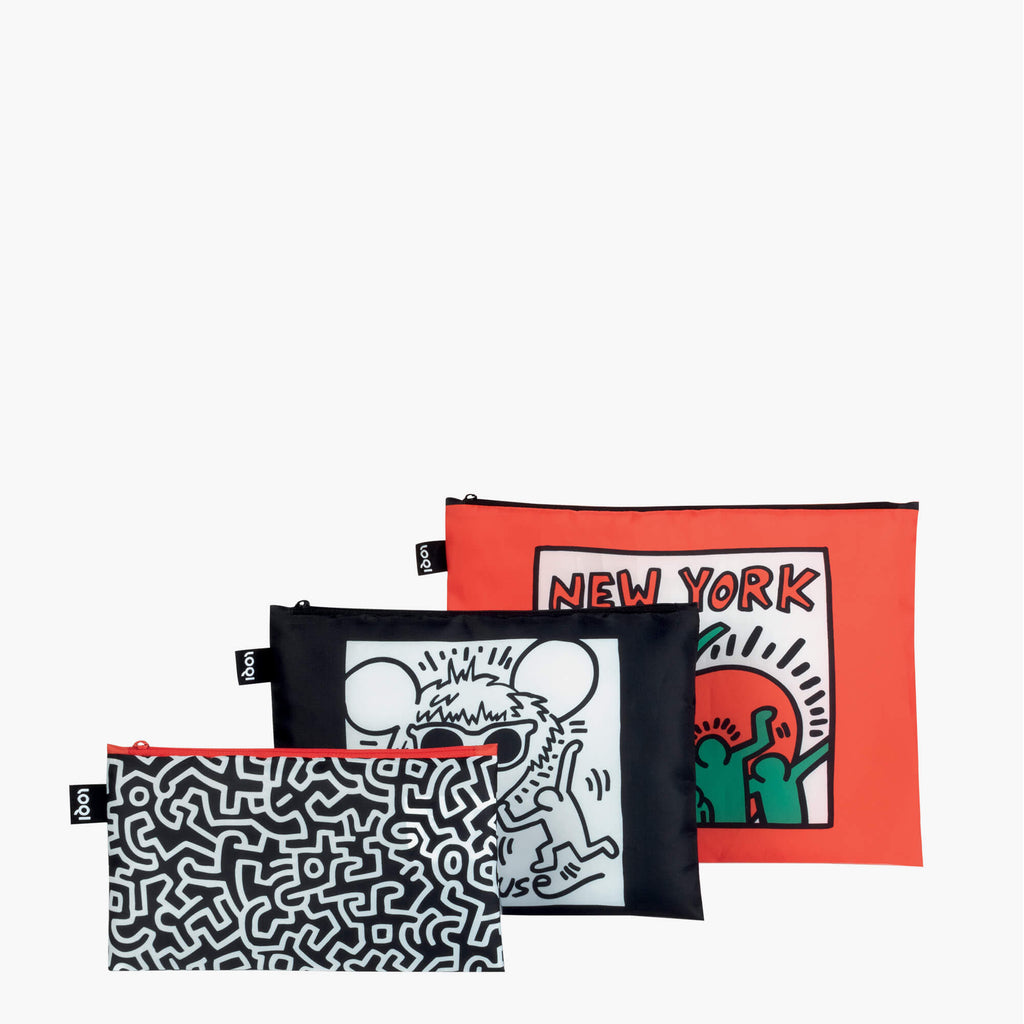 Set of three zip pockets with designs by Keith Haring