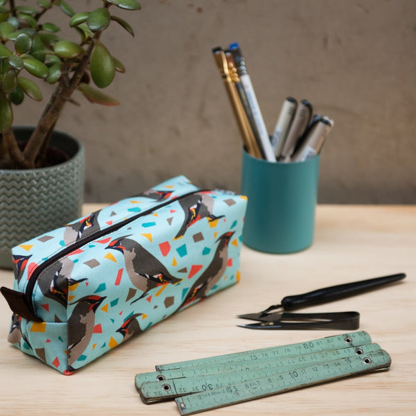 Graphic printed fabric pencil case with waxwing motif.