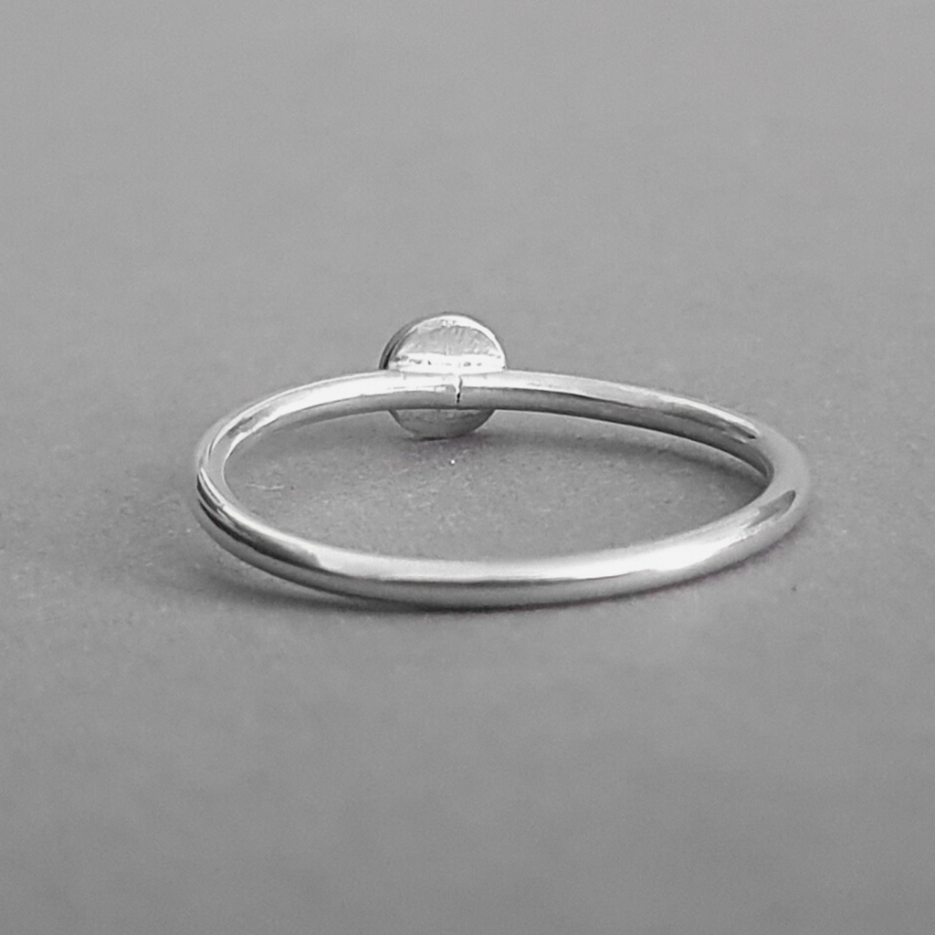 Product image.  Back image of Sterling silver stacking ring with star motif.
